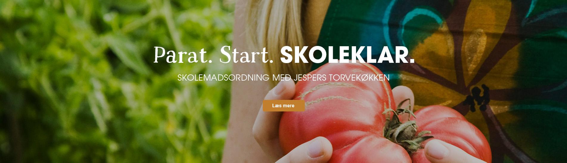 barn der holder en tomat til skole frokostordning